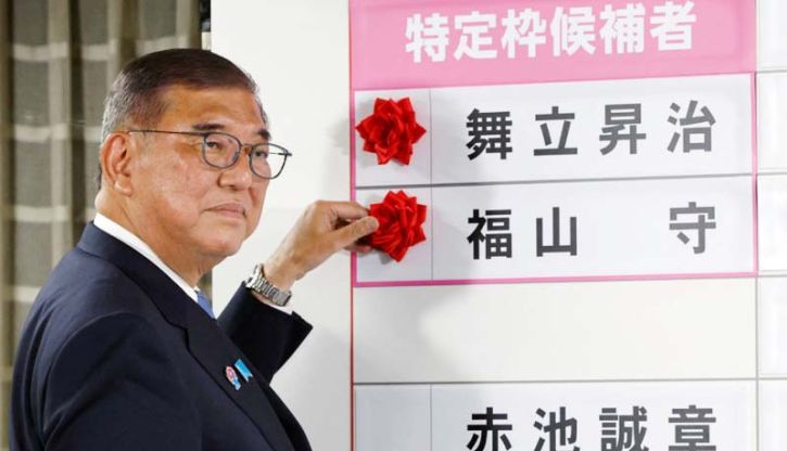 Japan's PM Ishiba vows to stay on despite bruising election loss