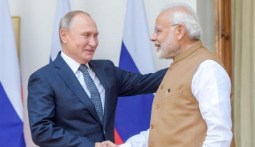 Putin seeks to boost energy, defence exports with India visit