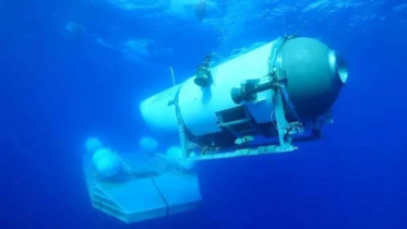 Searchers for Titanic submersible detect banging noises